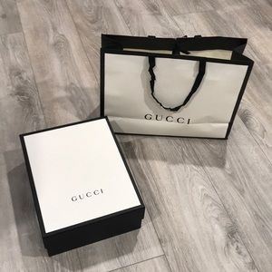 Gucci shoe box and bag.